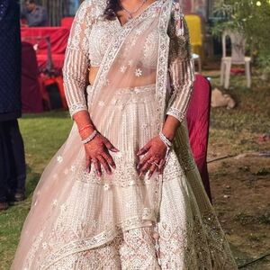 Elegant Cream Embroidered Indian lehenga